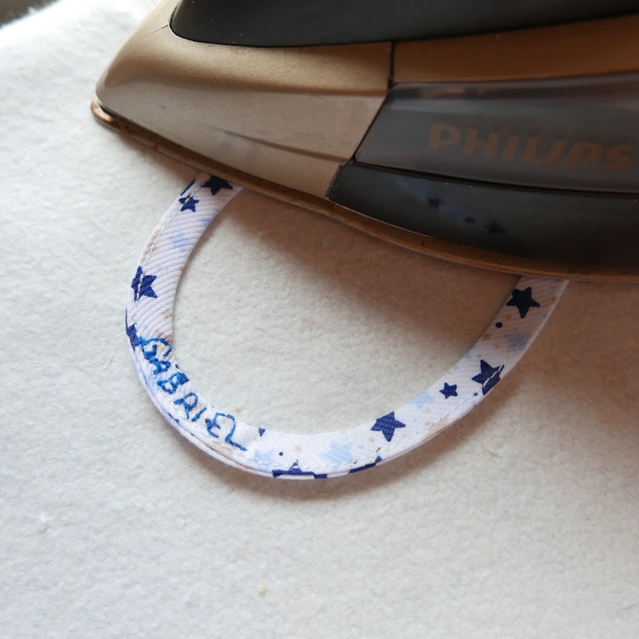 cinta para colgar el abrigo bordada