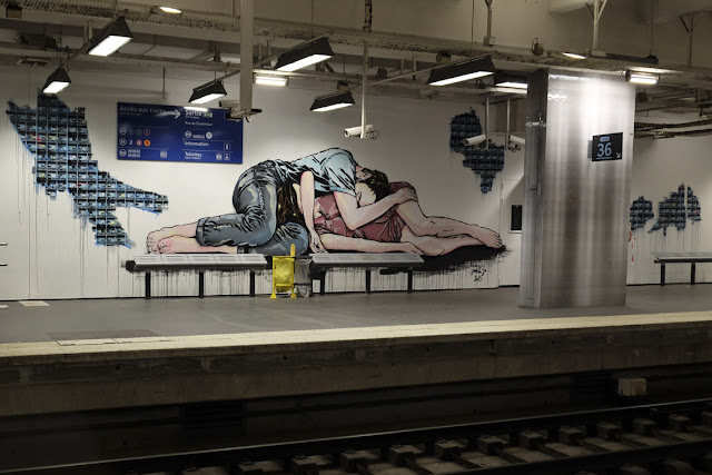 Along several other urban artists, Jana & JS were also part of the "Quai 36" street art project in Paris which saw a bunch of new pieces appearing at Gare Du Nord, one of the city's busiest train stations.