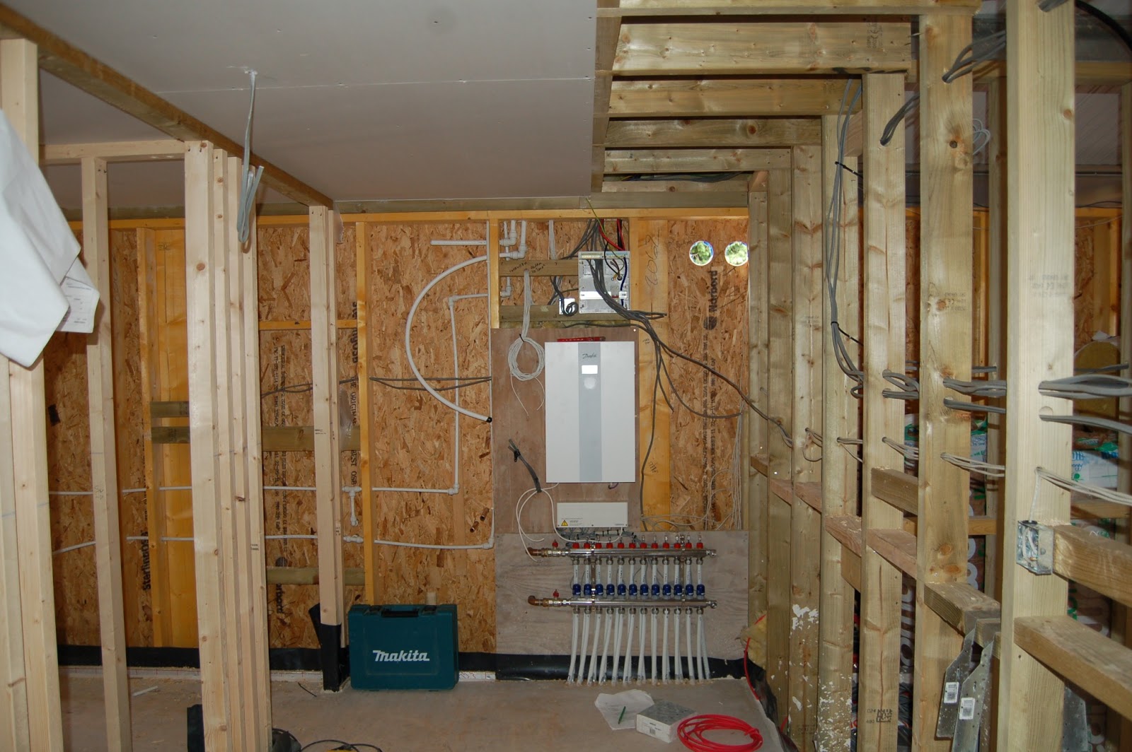Woodhayes: Air Source Heat Pump and First Fix Wiring