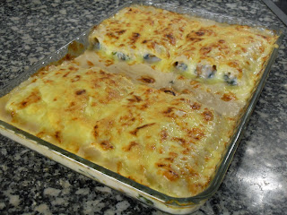 canelones rellenos de espinacas con jamón, queso ricota, nueces y huevo duro