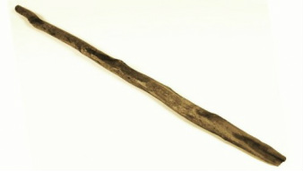 A wand made out of natural, unfinished wood