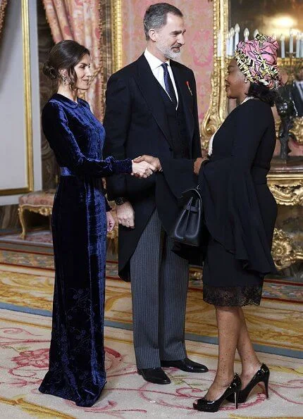 Queen Letizia wore a blue velvet gown by Spanish fashion house Felipe Varela, which she prefers to wear at these kind of events. aquamarine earrings