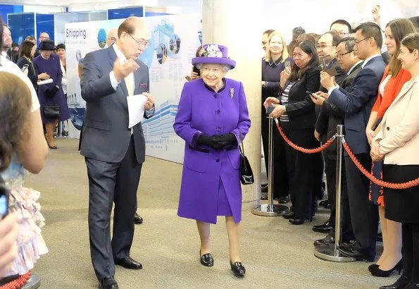 Britain's Queen Elizabeth II visited the International Maritime Organization (IMO) in London