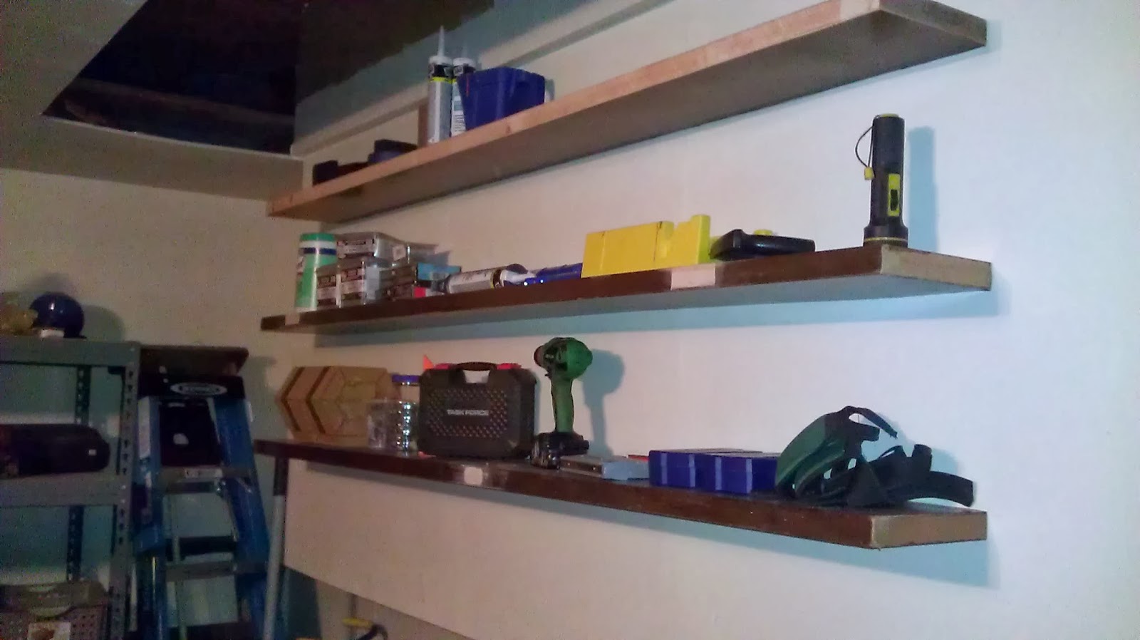 The Amos School of Construction The Floating Garage Shelves