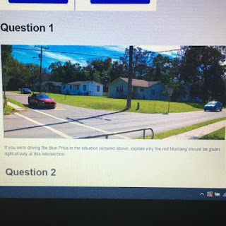 If you were driving the blue Prius in the situation pictured above, explain why the red Mustang should be given right-of-way at this intersection