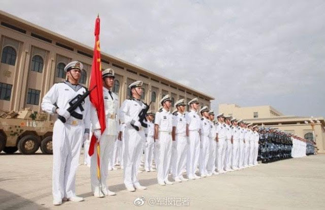 Image Attribute: A Chinese national flag ceremony and a military parade were held in the barracks / Source: China Defense Blog