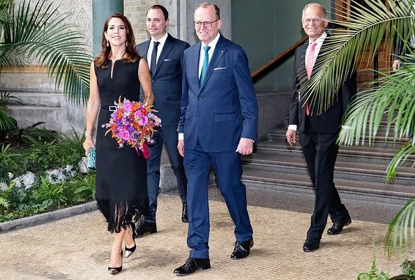 Crown Princess Mary carried Prada raso pietre clutch in turchese and she wore Gianvinto Rossi metal mesh pumps