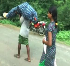 k Photos: Poor man carries his dead wife's body for 7 miles after hospital refused to provide a vehicle