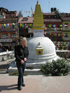 standing in front of Boudhanath Stupa Kathmandu