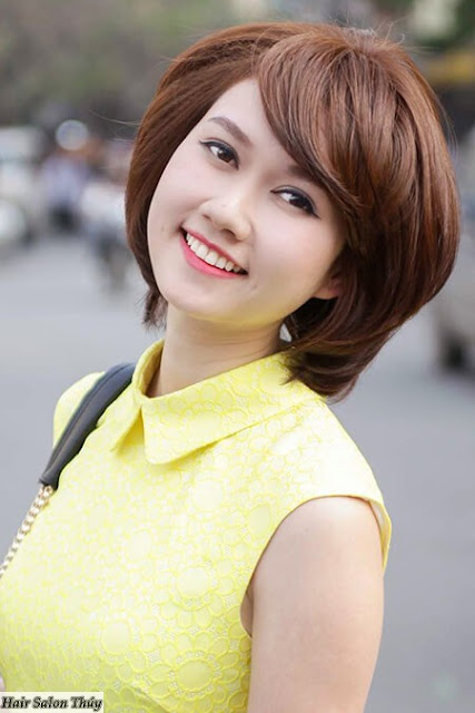 Kiểu tóc ngắn uốn cụp mái xéo toc uon cup duoi