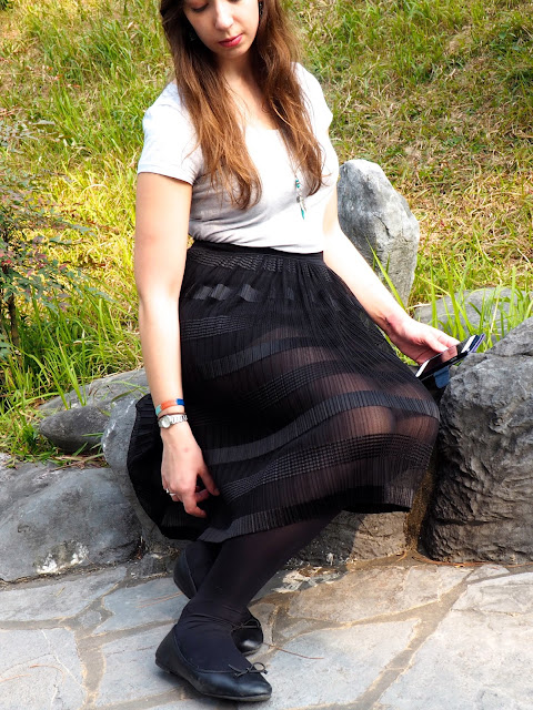 Balletic - outfit of plain grey t-shirt, long, floaty, sheer black skirt, with black tights and ballet flats