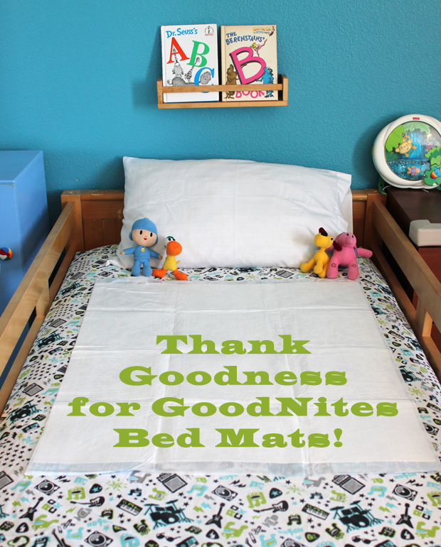 thank goodness for GoodNites bed mats written on bed 
