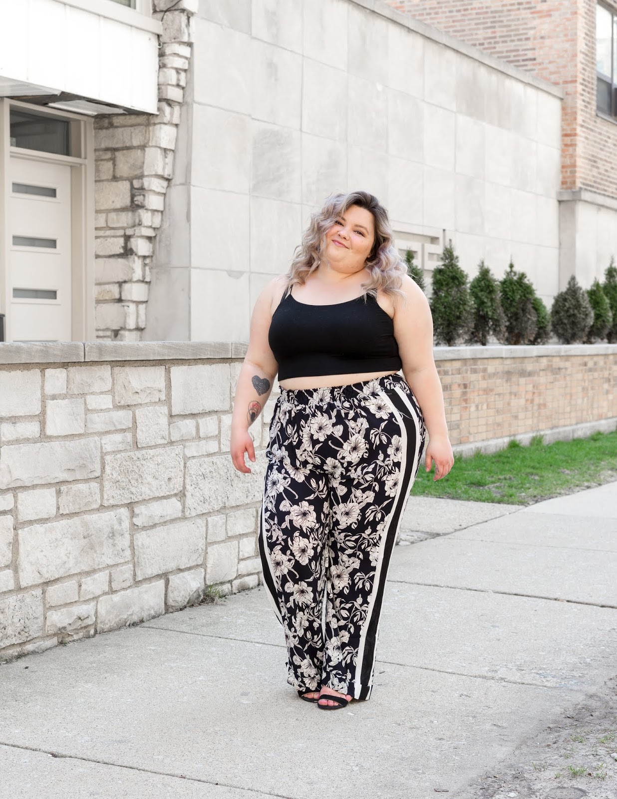 Chicago Plus Size Petite Fashion Blogger, YouTuber, and model Natalie Craig, of Natalie in the City, reviews Pink Clove UK's wide leg trousers and Fashion Nova Curves Crop Top.