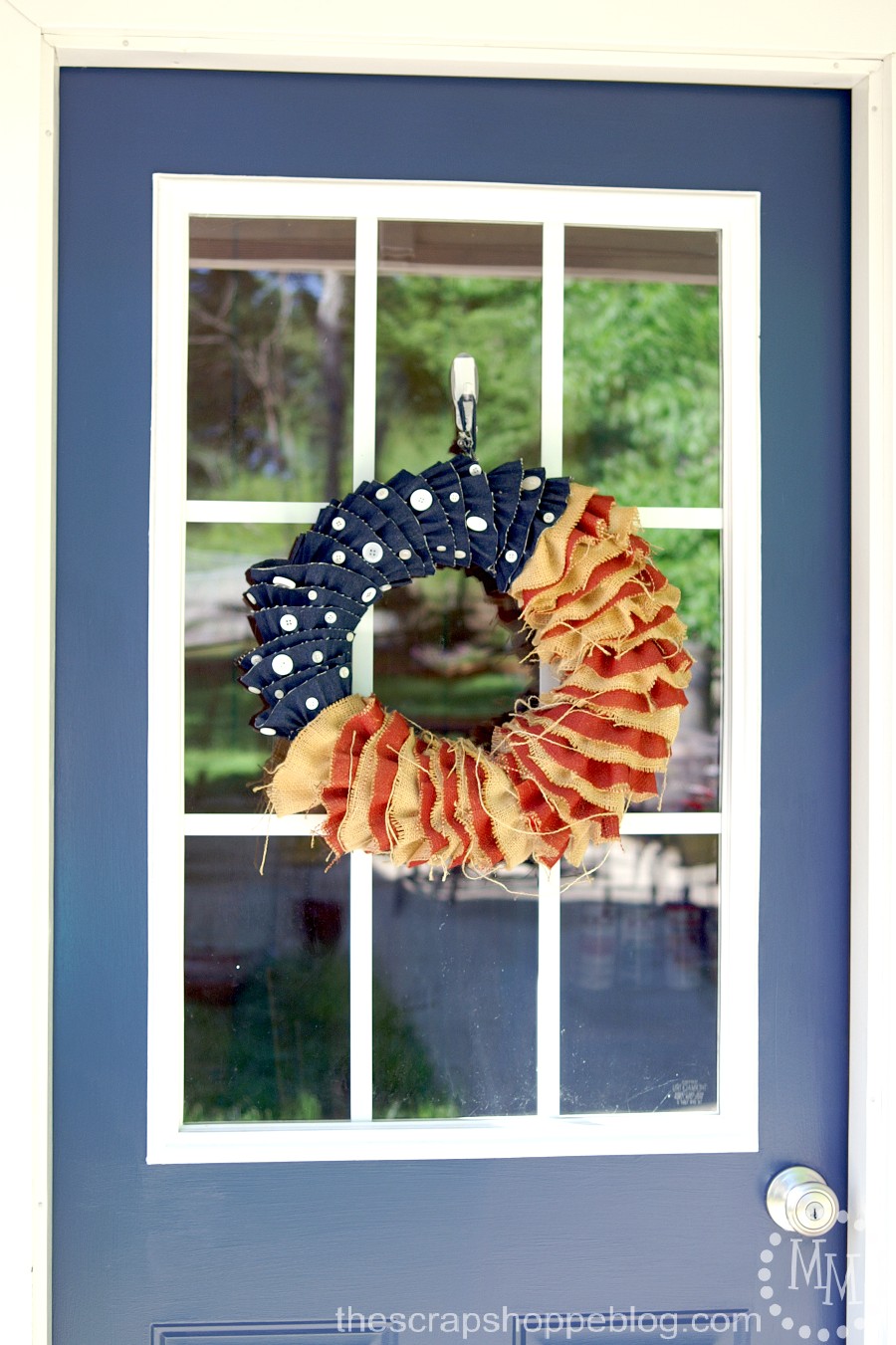 blue door flag wreath