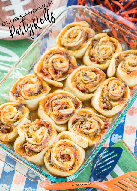 Club Sandwich Party Rolls -  so good! ham, turkey, roast beef, bacon and cheddar are rolled up (cinnamon bun style!) in soft, fluffy pizza dough. Then they’re drizzled with a brown sugar dijon glaze and baked until golden, gooey, and crispy. They are seriously so good!! I could eat them everyday!! Great for tailgating, brunch, lunch, dinner and parties! Always the first thing to go!