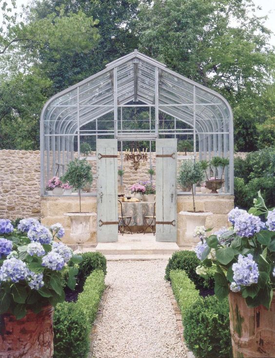 Beautiful greenhouse and French courtyard - Pamela Pierce.