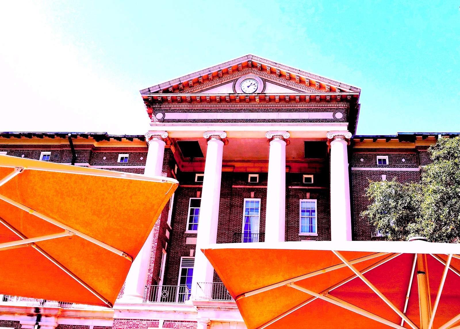 angels and people, life in New Orleans patio umbrellas and Hall