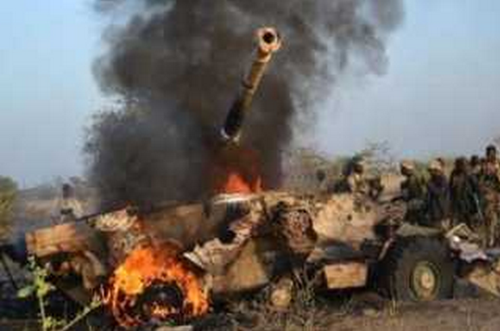 2 Pic of a Boko Haram AFV in flames after it was bombed by troops