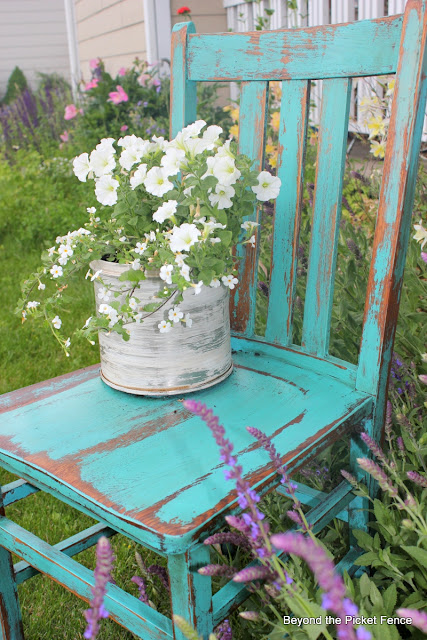 chair planter uses for wobbly chairs http://bec4-beyondthepicketfence.blogspot.com/2012/06/they-weeble-and-they-wobble.html