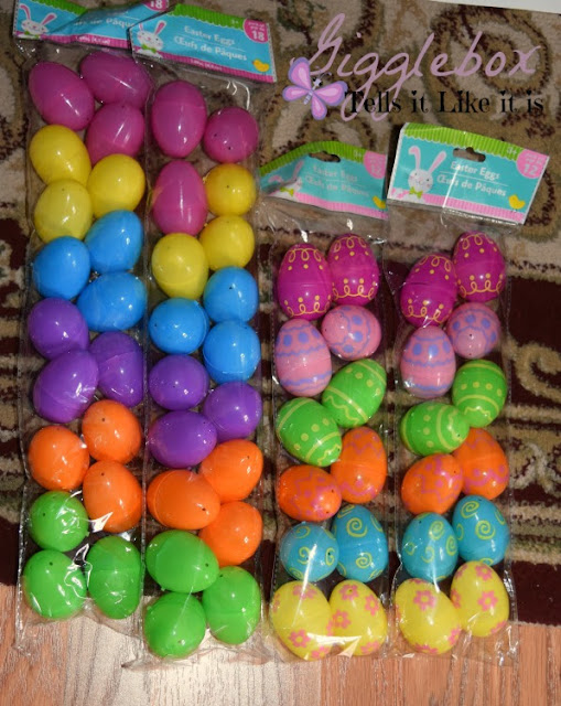 simple and cheap Easter decoration made with a gift bag plastic eggs and string, Easter decoration, cheap Easter decoration, using plastic Easter eggs for more than just egg hunts and baskets,