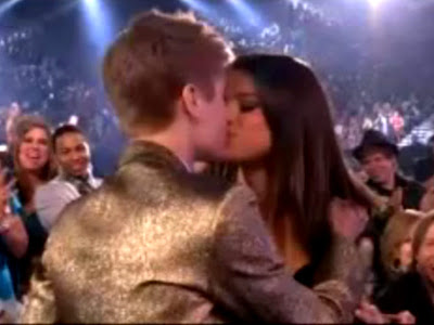 pics of justin bieber 2011 may. Justin Bieber kissing Selena