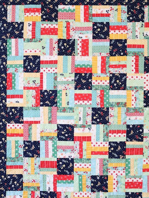 Strips and Squares quilt by Andy of A Bright Corner - pattern is from the book Perfectly Pretty Patchwork by Kristyne Czepuryk - fun scrappy quilt