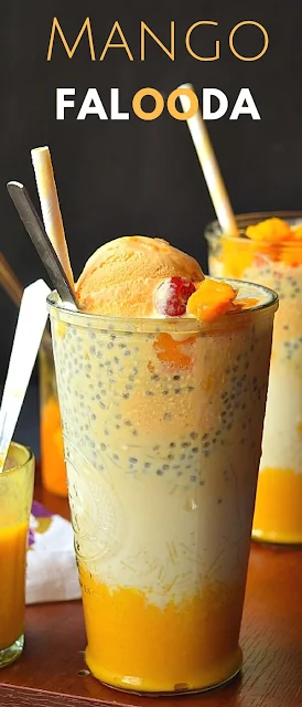 Closeup of Mango falooda topped with Mango Ice cream,cherry and Mango chunks