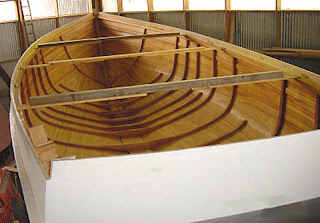 small wooden boat building