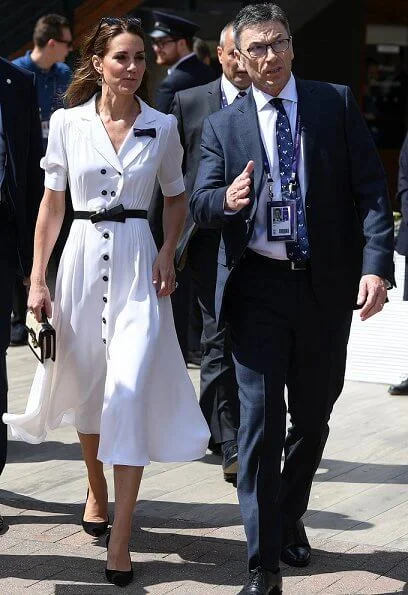 Kate Middleton wore a Suzannah flippy wiggle dress, Alexander McQueen Wicca raffia satchel, Tod's suede pumps