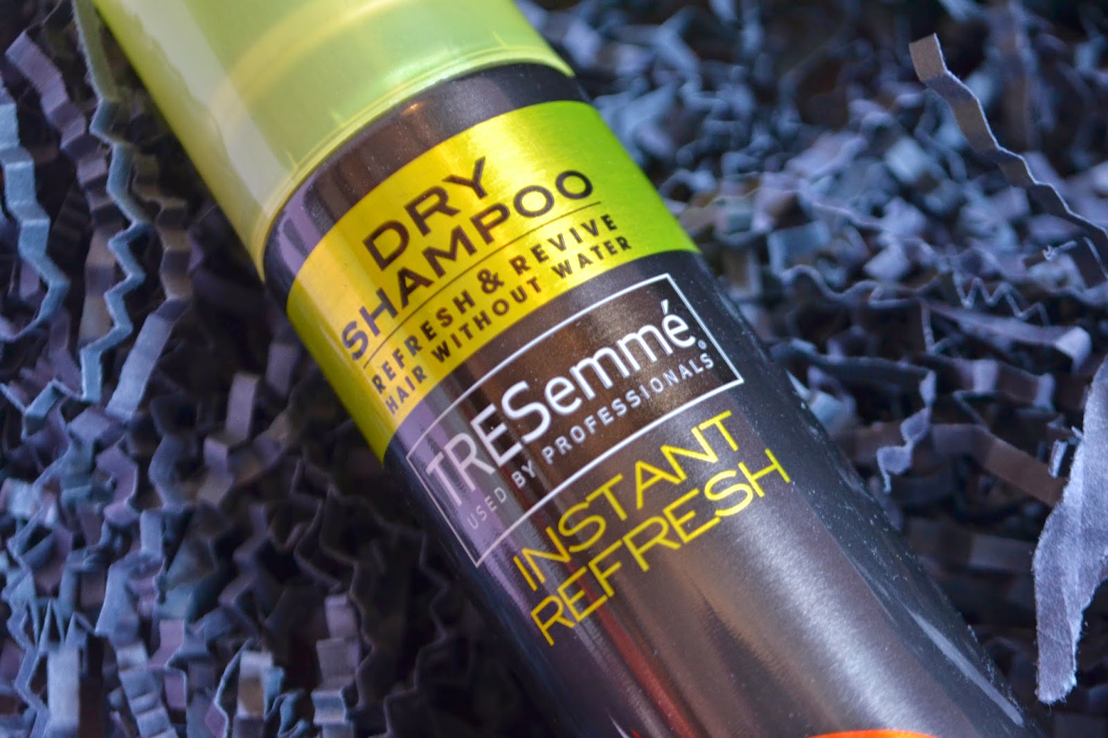 close up shot of the TRESEmme instant refresh dry shampoo