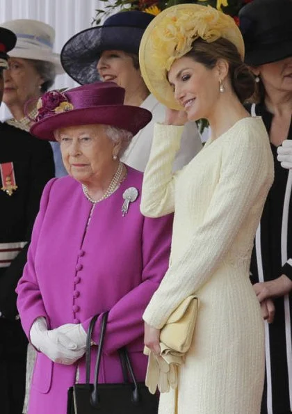 King Felipe, Queen Letizia welcomed by Queen Elizabeth II, Prince Philip, Prince Charles and Duchess Camilla. Felipe Varela dress, Prada pumps