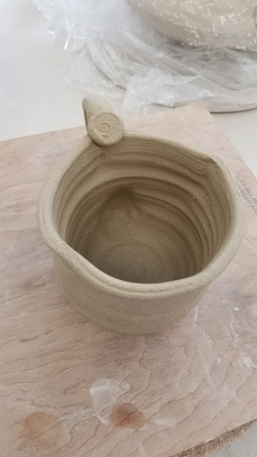 Ceramic mug in progress, handmade pottery by Lily L.