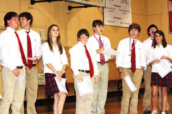 My youngest son Bryan Elmore,the one in the middle with the striped tie. (Spelling Bee win)