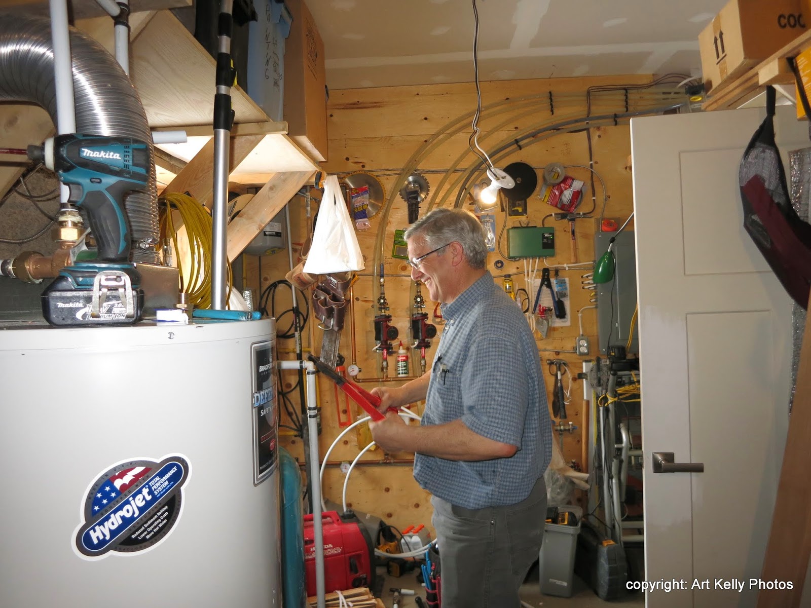 Image showcasing Living Off Grid - 45.05 N, 77.85 W: OFF GRID - ELECTRIC WATER HEATER