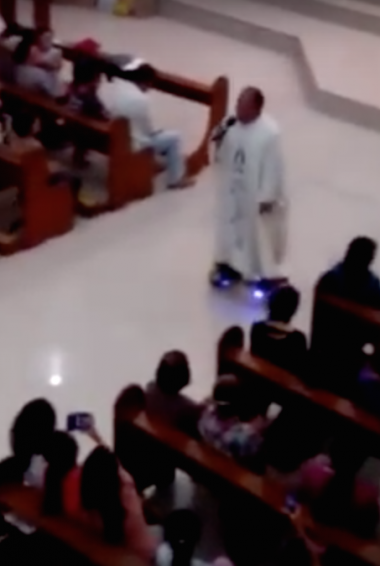 HOVER-BOARDING PRIEST, SO COOL AND HIP.