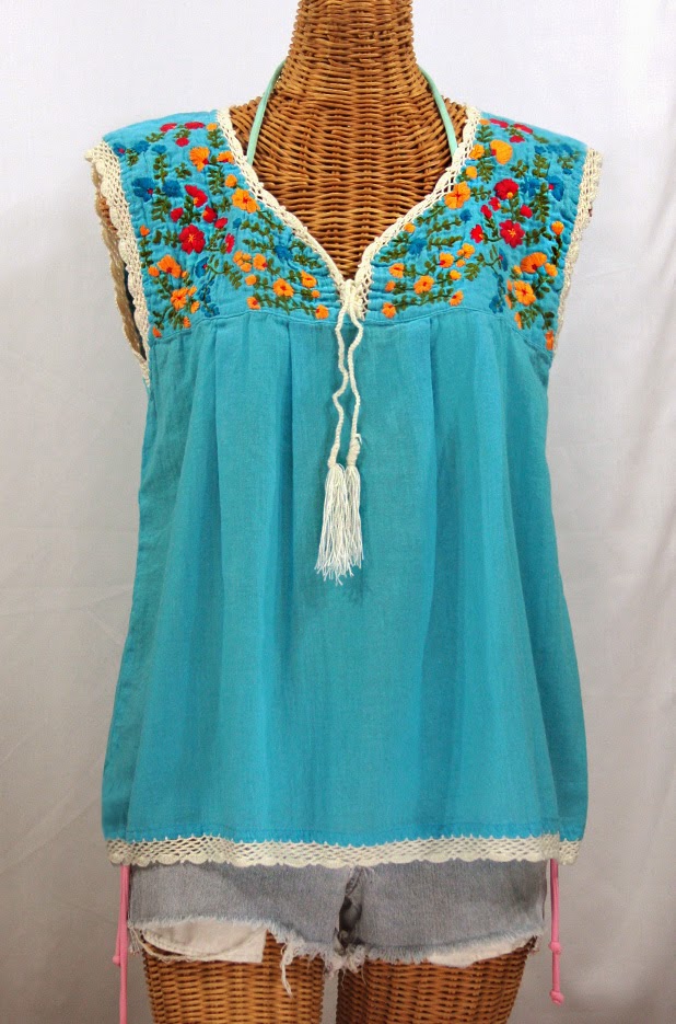 http://www.sirensirensiren.com/shop/new!-embroidered-peasant-tops/marbrisa-sleeveless-peasant-blouse/embroidered-sleeveless-mexican-blouse-marbrisa-aqua-blue