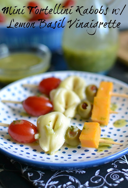 A light and delicious appetizer that's perfect for any Italian themed meal! The bold and tangy flavors are sure to satisfy any appetite! Mini Tortellini Kabobs with Lemon Basil Vinaigrette Recipe from Hot Eats and Cool Reads