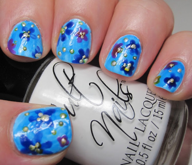Cult Nails Tempest with a wash of Pink Cookie Neon Blue, and neon flowers