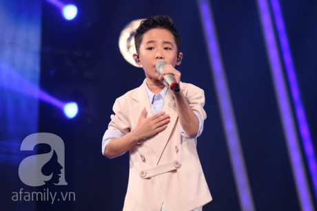 Bat ngo voi su lot xac cua cau be ngheo thi Vietnam Idol Kids - Anh 10