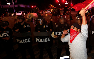California Police Clash With Protesters Outside Donald Trump rally In Costa Mesa 