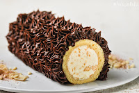 Biscuit roulé con crema de jijona y chocolate trufado