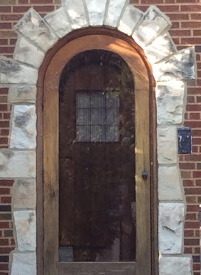 sears front door rounded wood door with curved iron hinge at top
