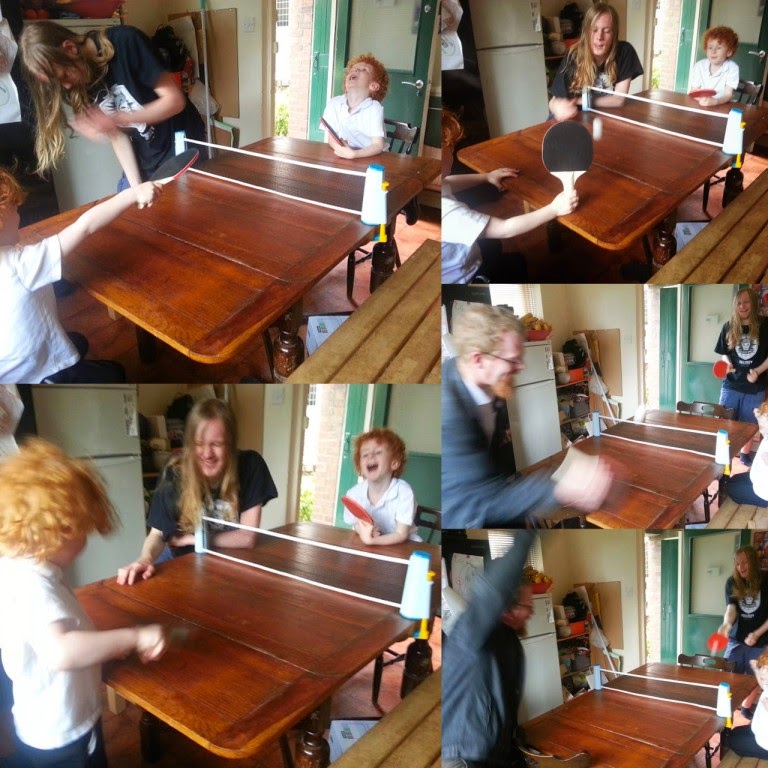 People playing table tennis in the kitchen