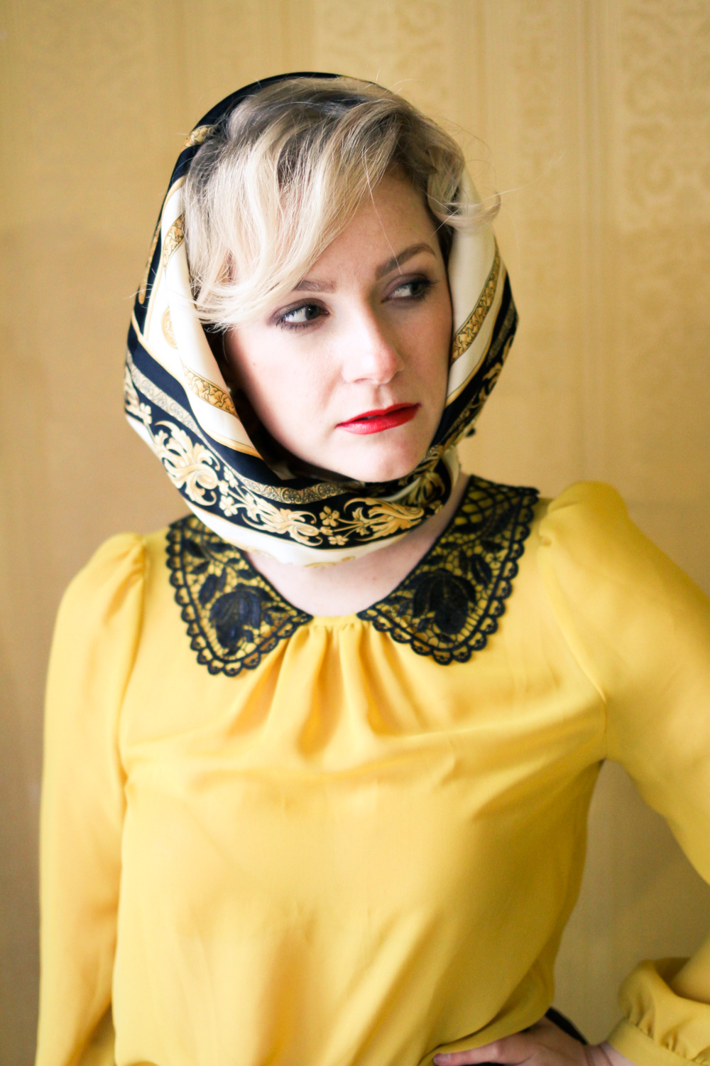 @findingfemme in yellow blouse with black lace collar, black Review Australia skirt, black bow heels and classic scarf.