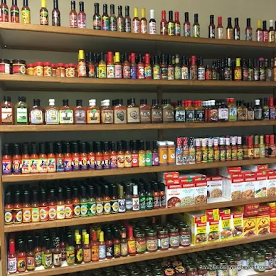 wall of hot sauces at Pedrick Produce in Dixon, California