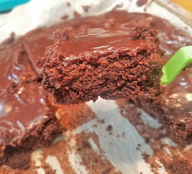 this is a sheet cake dark chocolate fudge cake made with cake mix and brownie mix also topped with dark chocolate frosting