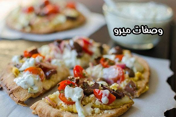 طريقة عمل بيتزا الخبز اللبنانى بالدجاج والجبن الموزاريلا