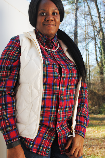 An fall/winter outfit inspiration post featuring a plaid flannel shirt, J. Crew Factory vest, and boots.