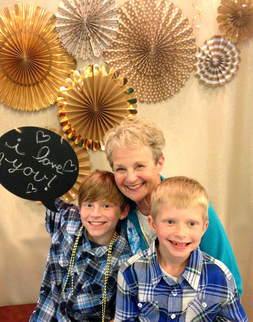Photo booth at a gold themed party.