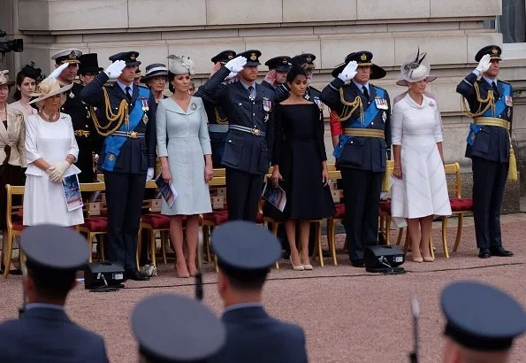 Countess Sophie wore Suzannah Wave Textured Stripe Dress, Meghan Markle wore Dior navy fit and flare dress with bateau neckline. Kate Middleton